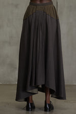 BACK PLEATS ASYMMETRIC SKIRT