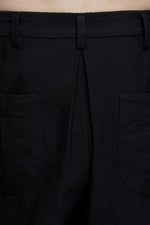 PLEATED TAPERED TROUSERS